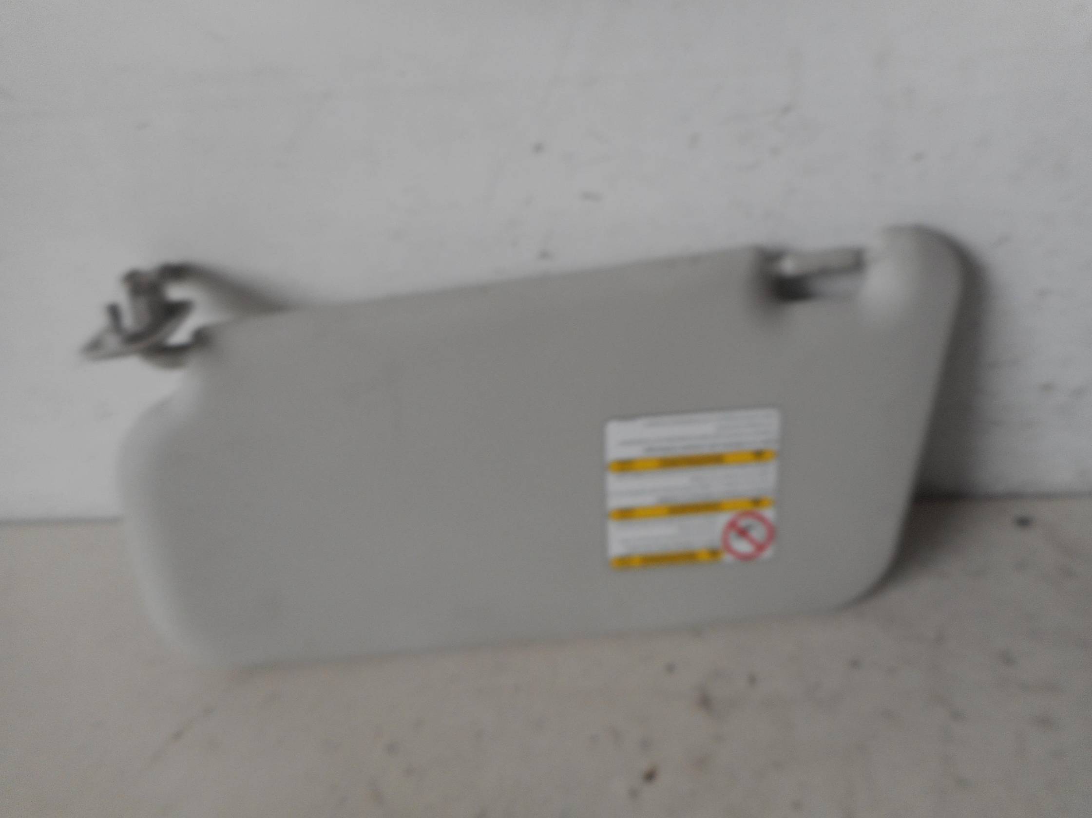 Aletta parasole parabrezza dx.